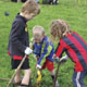 Children planting trees.
