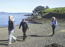 Image of people on the Park Point coastal walkway. 